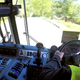 Image for article titled Here's How Garbage Truck Robot Arms Work: An Explainer